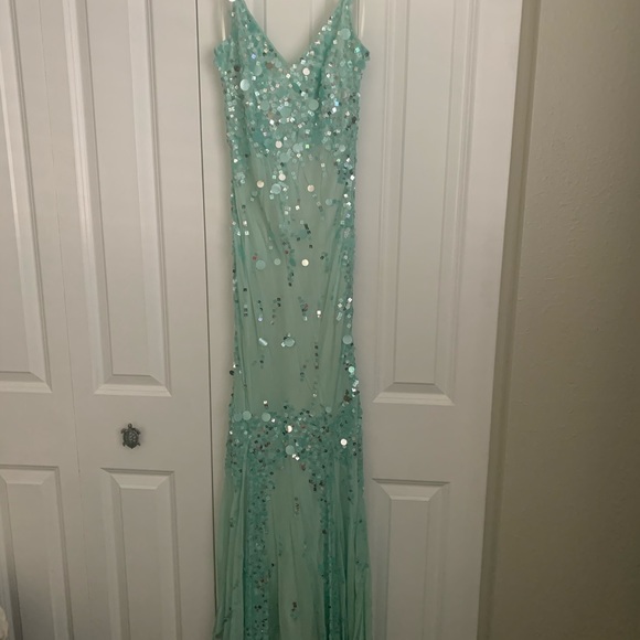 Dresses & Skirts - Beautiful boutique and one of a kind, teal sequined, slight mermaid bodice dress